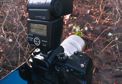 Close-up of camera on field