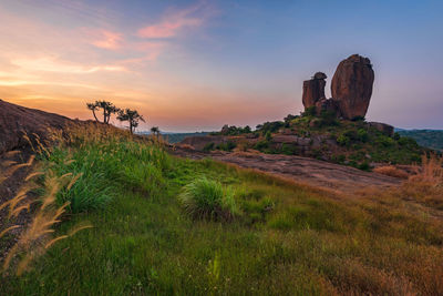 View of stone wall against sky during sunset