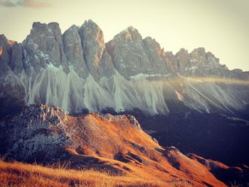 View of rocks on mountain against sky