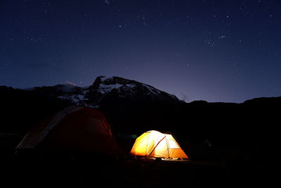 Tent against sky at night