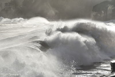 Sea waves splashing on shore