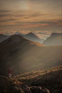 Scenic view of mountains against sky during sunset