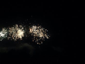 Firework display at night