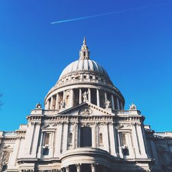 Low angle view of church against blue sky