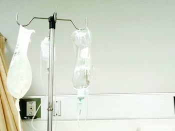 Close-up of saline drip in hospital