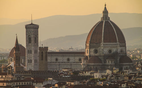 
duomo santa maria del fiore in city during sunset