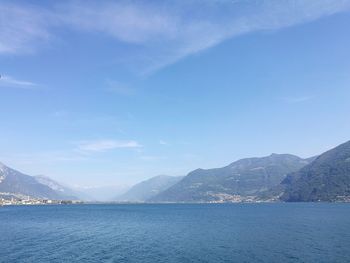 Scenic view of lake against blue sky