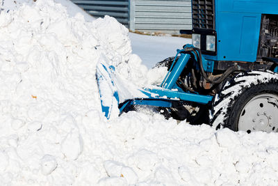 Garbage in snow covered car