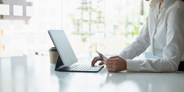 Man using laptop on table
