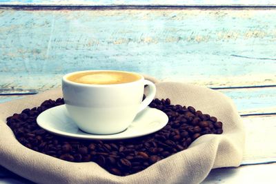 Close-up of coffee cup on table