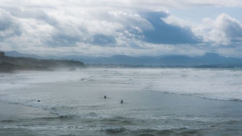 Scenic view of sea and cloudy sky