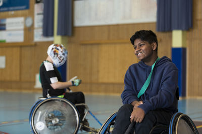 Disabled people playing in gym