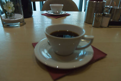 Close-up of coffee cup on table