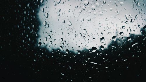 Close-up of water drops on glass