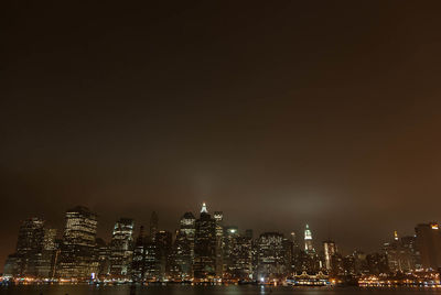 Illuminated cityscape at night