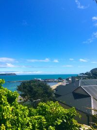 Scenic view of sea against blue sky