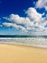 Scenic view of beach against sky