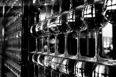 Close-up of wine bottles on rack