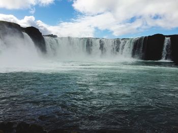 View of waterfall against sky