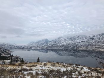 Scenic view of mountains against sky during winter