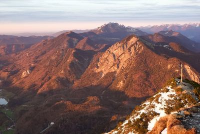 Scenic view of mountains against sky during sunset