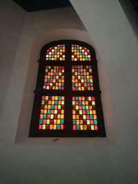 Low angle view of multi colored window in temple