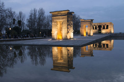 Reflection of temple in lake at dusk. debod.