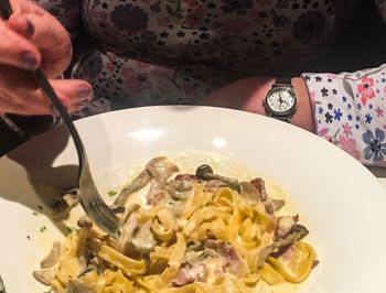 Close-up of hand eating food