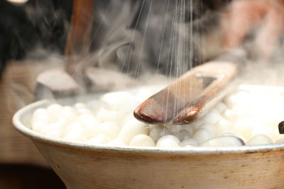 Close-up of silk reeling in factory