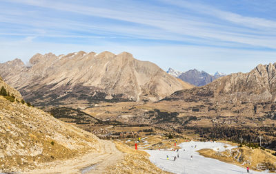 Scenic view of mountains against sky during winter