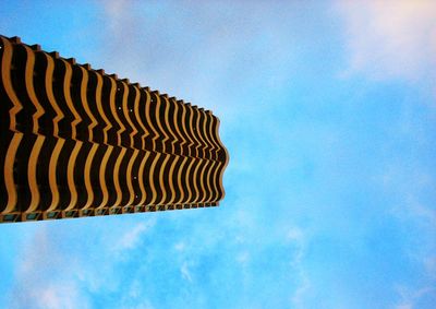 Low angle view of building against blue sky