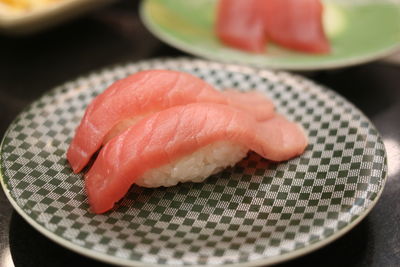 Close-up of sushi served on table