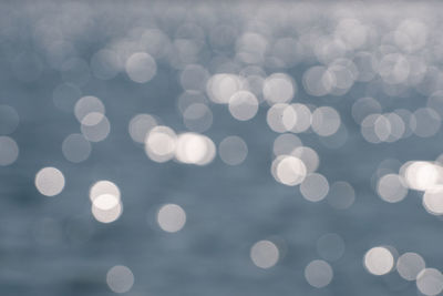 Defocused image of sea against blurred background