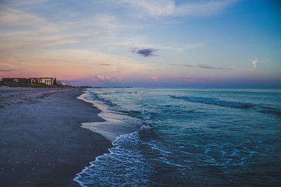 Scenic view of sea at sunset