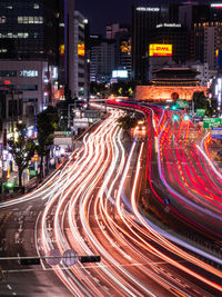 Light trails on city street at night