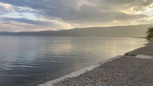 Scenic view of lake against sky during sunset