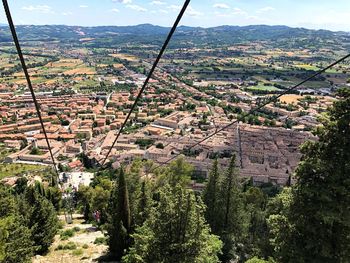 High angle view of townscape and trees in town