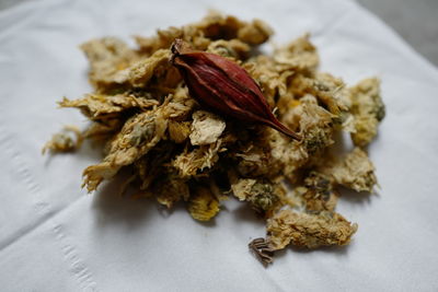 High angle view of dry leaves on table