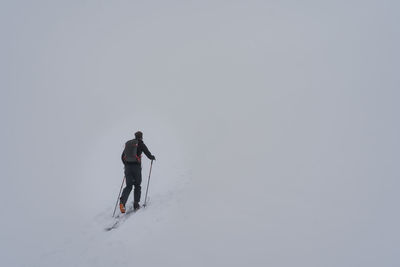 Man skitouring near davos