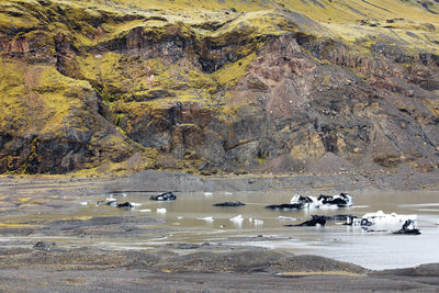 Scenic view of rock formation by sea