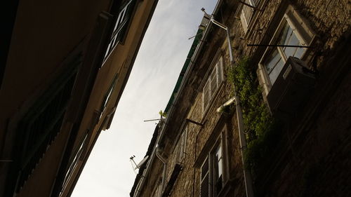 Low angle view of residential building against sky