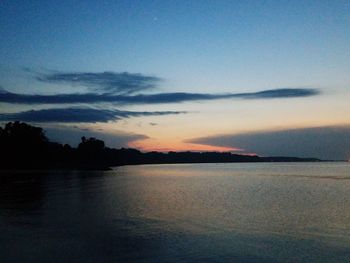 Scenic view of sea against sky at sunset