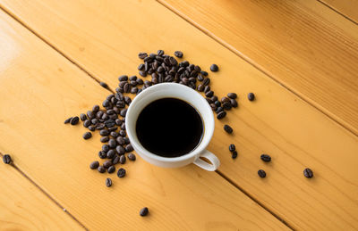 High angle view of coffee cup on table