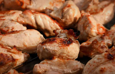 Close-up of meat on barbecue