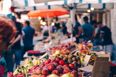 Group of people at market stall