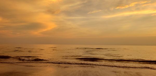 Scenic view of sea against sky during sunset