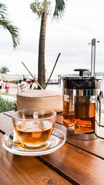 Close-up of tea on table against sky