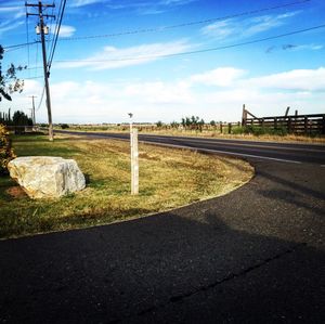 Empty road along landscape