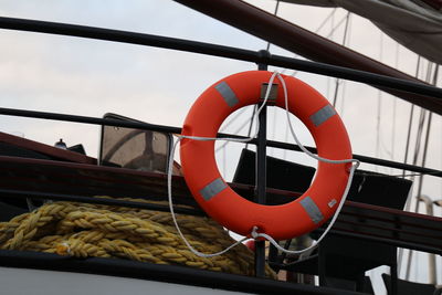 Low angle view of rope tied on boat