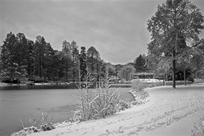 Scenic view of frozen lake against sky